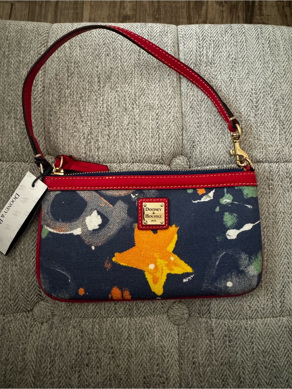 NWT, Dooney & Bourke  vintage medium paint - splash print wristlet.